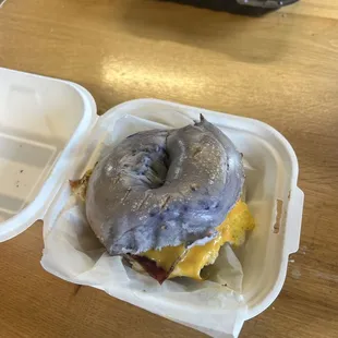 a donut in a styrofoam container
