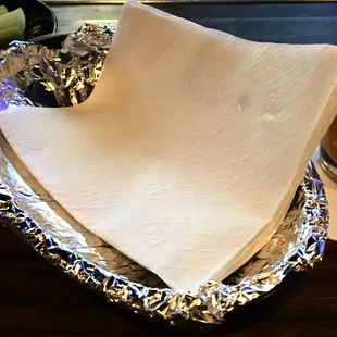 Lots of Napkins and a basket to place the remains.