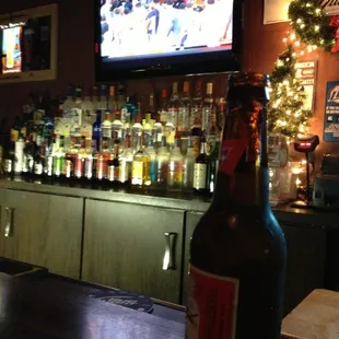 a bottle of beer on the bar