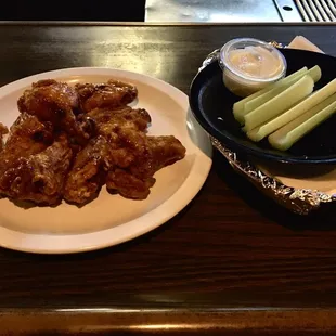 Wings with Sweet Cajon Sauce and a side of Crispy Fresh Celery.