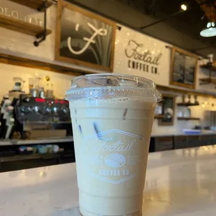 a cold beverage in a plastic cup