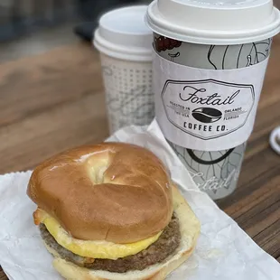 a sandwich and a cup of coffee