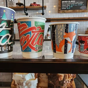 a variety of coffee cups