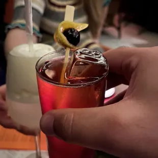 Cherry pop cocktail, pineapple foam mocktail