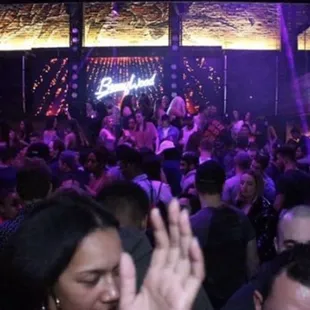 a crowd of people at a nightclub