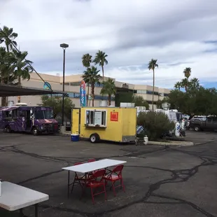 ood trucks parked in a parking lot