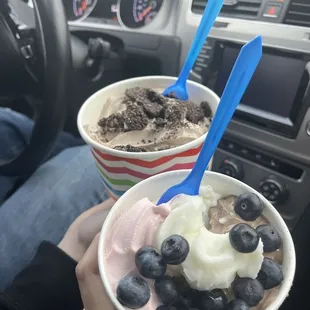 two bowls of ice cream and blueberries