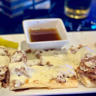 Italian beef flatbread with au jus.