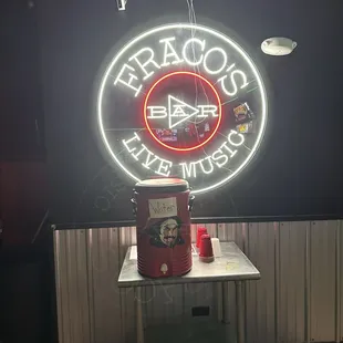 a neon sign in a dark room