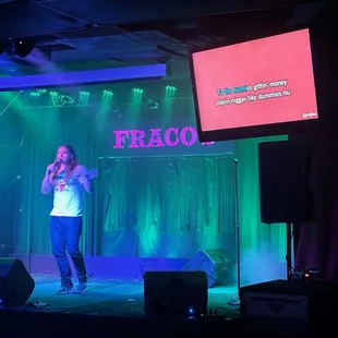 One of the warm up guys started off the karaoke after the comedy ended.