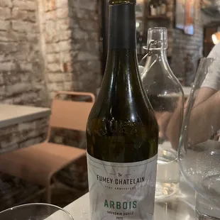 a bottle of wine on a table