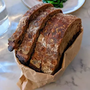 a loaf of bread in a paper bag