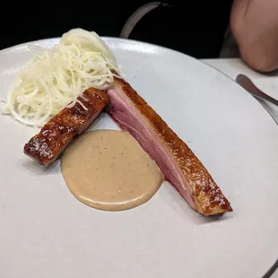 October 13, 2022; Plum-glazed duck with kohlrabi and bread sauce.