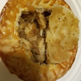 Turkey tail meat pie, minus 1 piece of turkey tail meat.