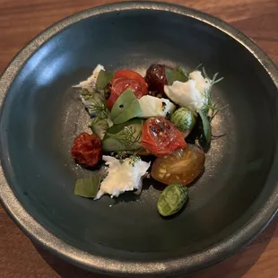 Tomatoes with double 8 mozzarella and Urfa chili oil