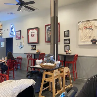 a restaurant with tables and chairs