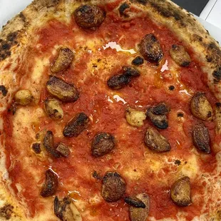 a pizza with mushrooms