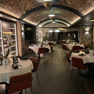 Awesome, intimate, private, room with great lighting, a private bar and a wine wall. The brick walls and arched ceiling were fabulous.