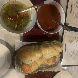 Homemade garlic knots w/ marinara sauce and garlic olive oil.