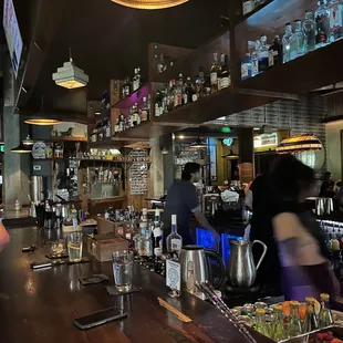 a bar with people at it