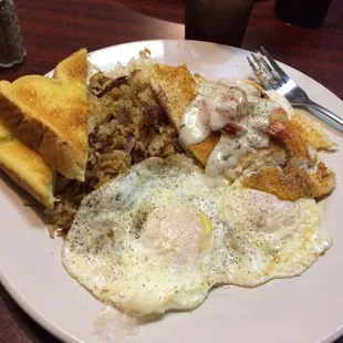 Baked Tilapia w/ shrimp, hollandaise sauce, brown rice, eggs over easy &amp; toast, topping it off w/ freshly brewed sweet Iced Tea.