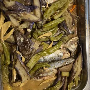 a pan of fish and vegetables
