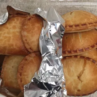 $1 each empanadas - half chicken half beef
