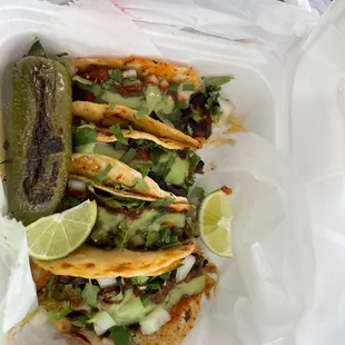 Two asada and two Al pastor, with a grilled jalapeño!