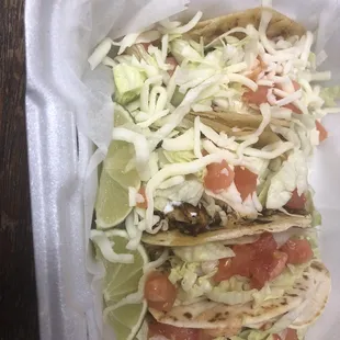 One chicken, one beef and two shrimp tacos!