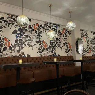 The decor is beautiful and inviting!  They high &amp; low table booths!