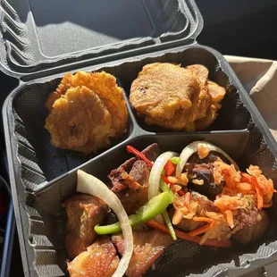 Griot (fried pork) and plantains