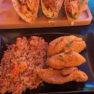 Swamp tacos, catfish, and crawfish rice