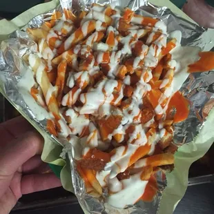 Buffalo chicken fries served with ranch and Frank&apos;s hot sauce