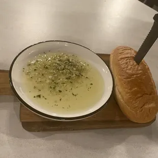 Complimentary bread with seasoned olive oil for dipping