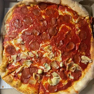 Upside Down Pizza, Pepperoni, Half with Artichoke hearts.