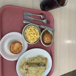 Ribs and sauerkraut, Mac and cheese mashed potatoes with gravy and cornbread