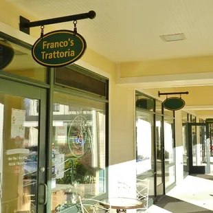 New hanging signs will help guide customers to other shops at Mill Village..