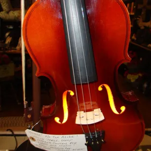 The violin body has color changing LEDs and a hidden Blue Tooth speaker!