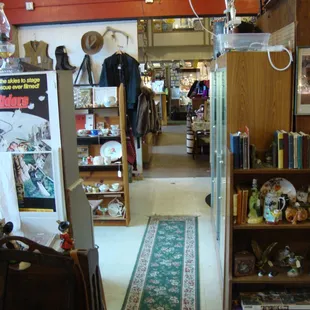 View looking towards the front of the store from the back, garage area.