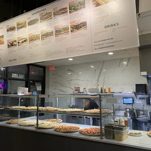 pizzas on display