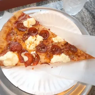 ricotta cheese with pepperoni and hot honey sauce was drizzled over it when it came out of the oven