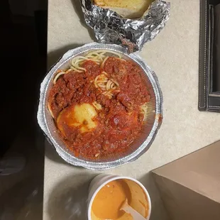 Spaghetti with meat sauce and cheese ravioli, Tomato basil soup, garlic bread.  $8 bucks