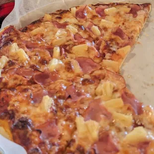 Large pizza with Canadian bacon and pineapple