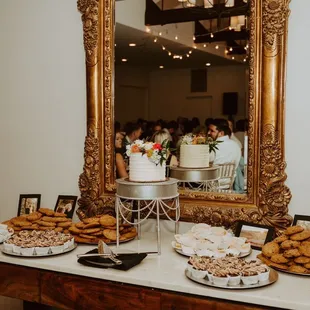 a table of pastries and desserts