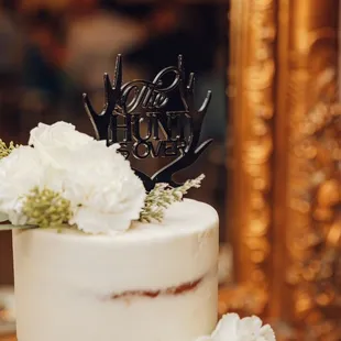 a wedding cake with white flowers