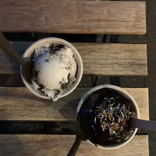 Mint Brownie + Chocolate SuperCake w/ hot fudge + flower sprinkle-sprankles. Cute girlfriend foot visible beneath the table.