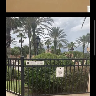 a fence with a sign on it