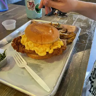 Mac and cheese chicken sandwich with fries