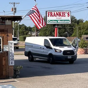 a white van in a parking lot