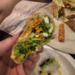 Veggie roll interior. Fresh Veggies with Spanish rice and queso